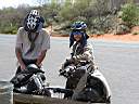 Two loonies riding pushbikes to Ayers Rock